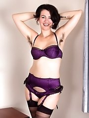 Hairy girl Sadie Lune strips in purple lingerie